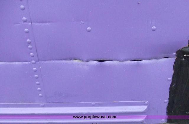 Sheet metal damage on converted schoolbus