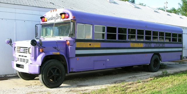 Bus with a few linear feet of purple paint stripped