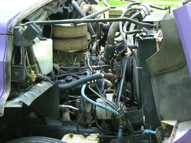 Bus engine compartment, passenger side, freshly washed