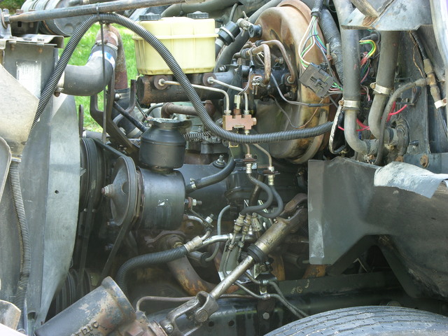 Bus engine compartment, driver side, freshly washed