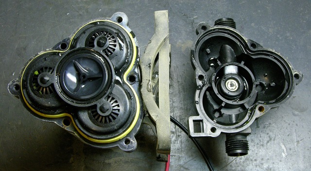 RV fresh water pump, top part of case removed