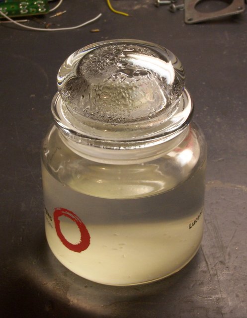 Tinnit solution in glass jar