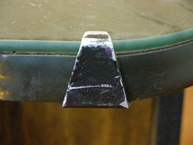 Worn tabletop glass clip