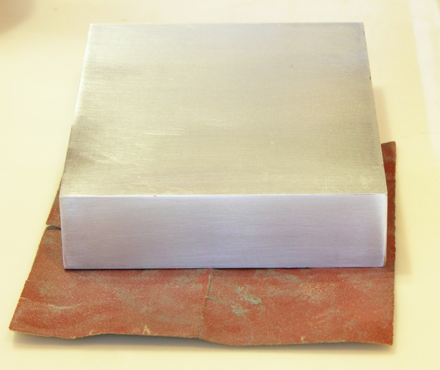 Aluminum block, face sanded with 180 grit