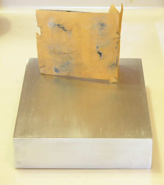 Aluminum block, face sanded with 220 grit