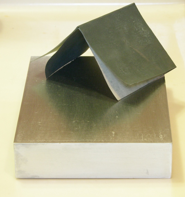 Aluminum block, face and end sanded with 660 grit