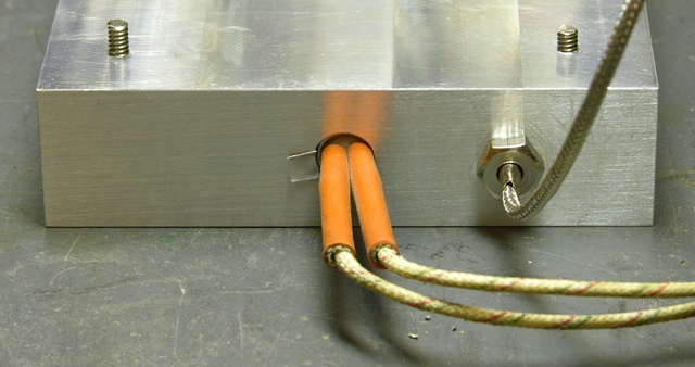 Aluminum block with heater element and thermocouple