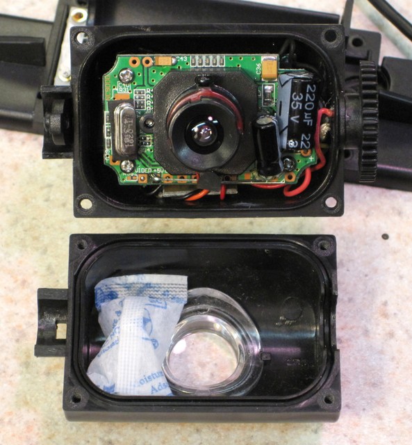 Wireless backup camera with dessicant inside
