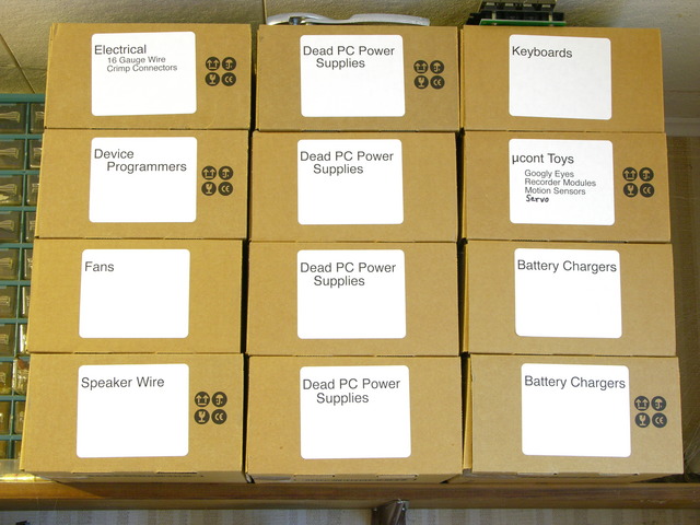 Boxes of electronics surplus and supplies