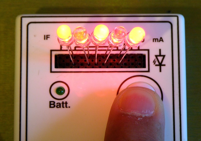 Diffused and non-diffused LEDs in tester, lit