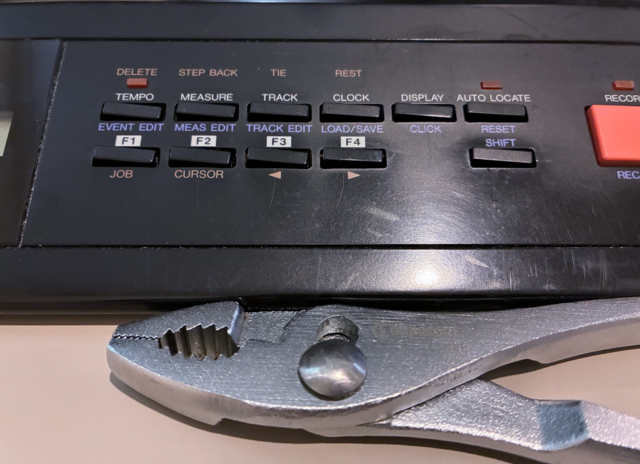 Yamaha QX5 MIDI sequencer, buttons replaced and askew