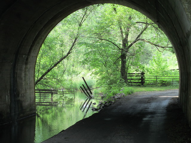 Railroad bridge over road and waterway in Maryland